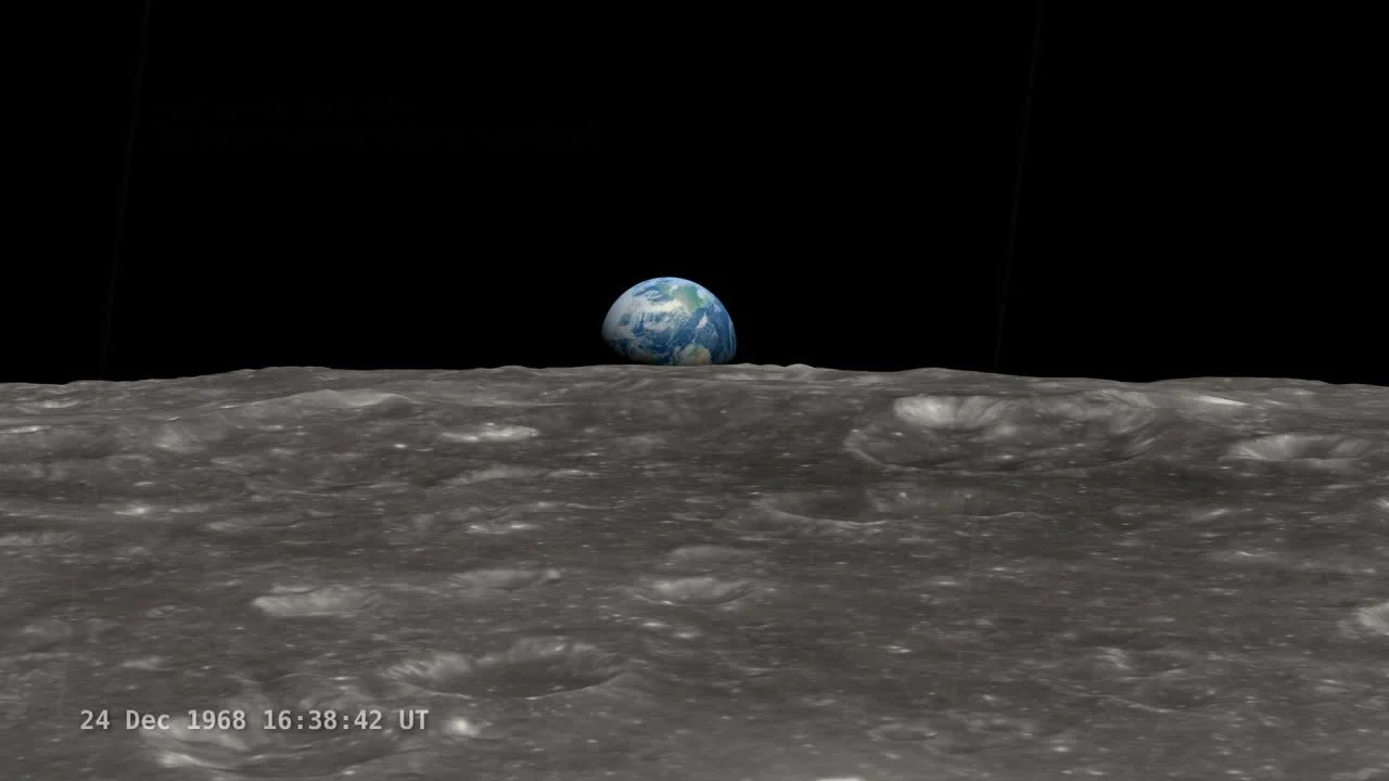 Earth rising above the cratered lunar surface during the Apollo 8 mission, dated December 24, 1968.
