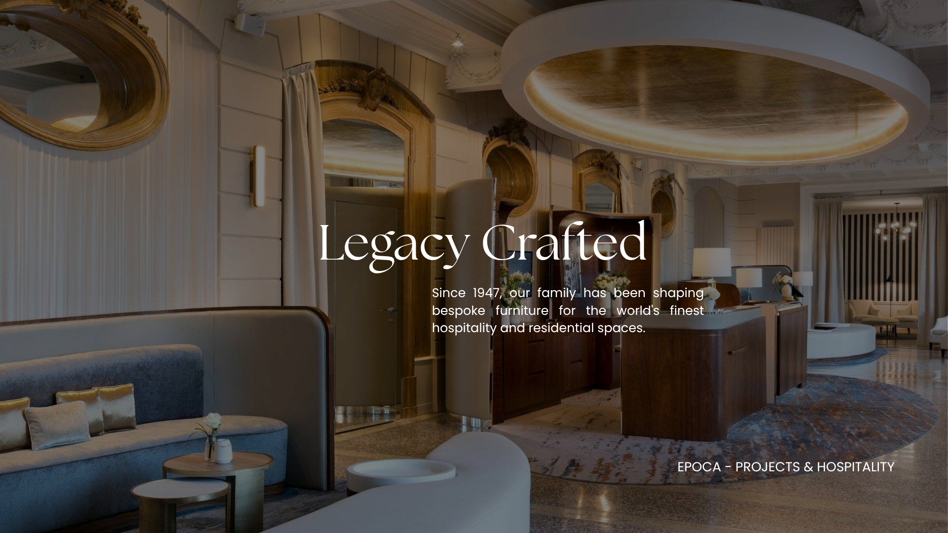 Interior of an elegant hospitality lobby with modern and vintage furniture, incorporating wood accents, mirrors, and ambient lighting.