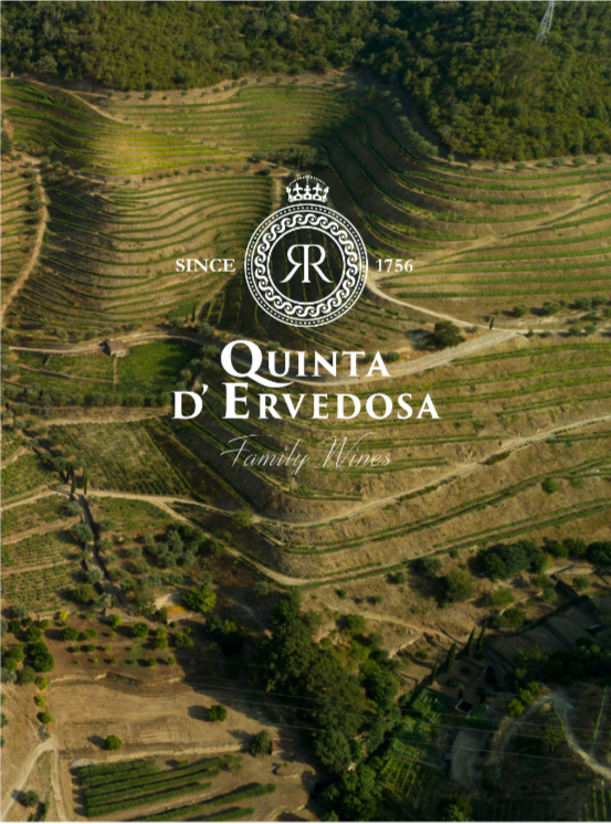 Aerial view of terraced vineyards or farmland with a logo overlay for Quinta d'Ervedosa family wines, established in 1756.