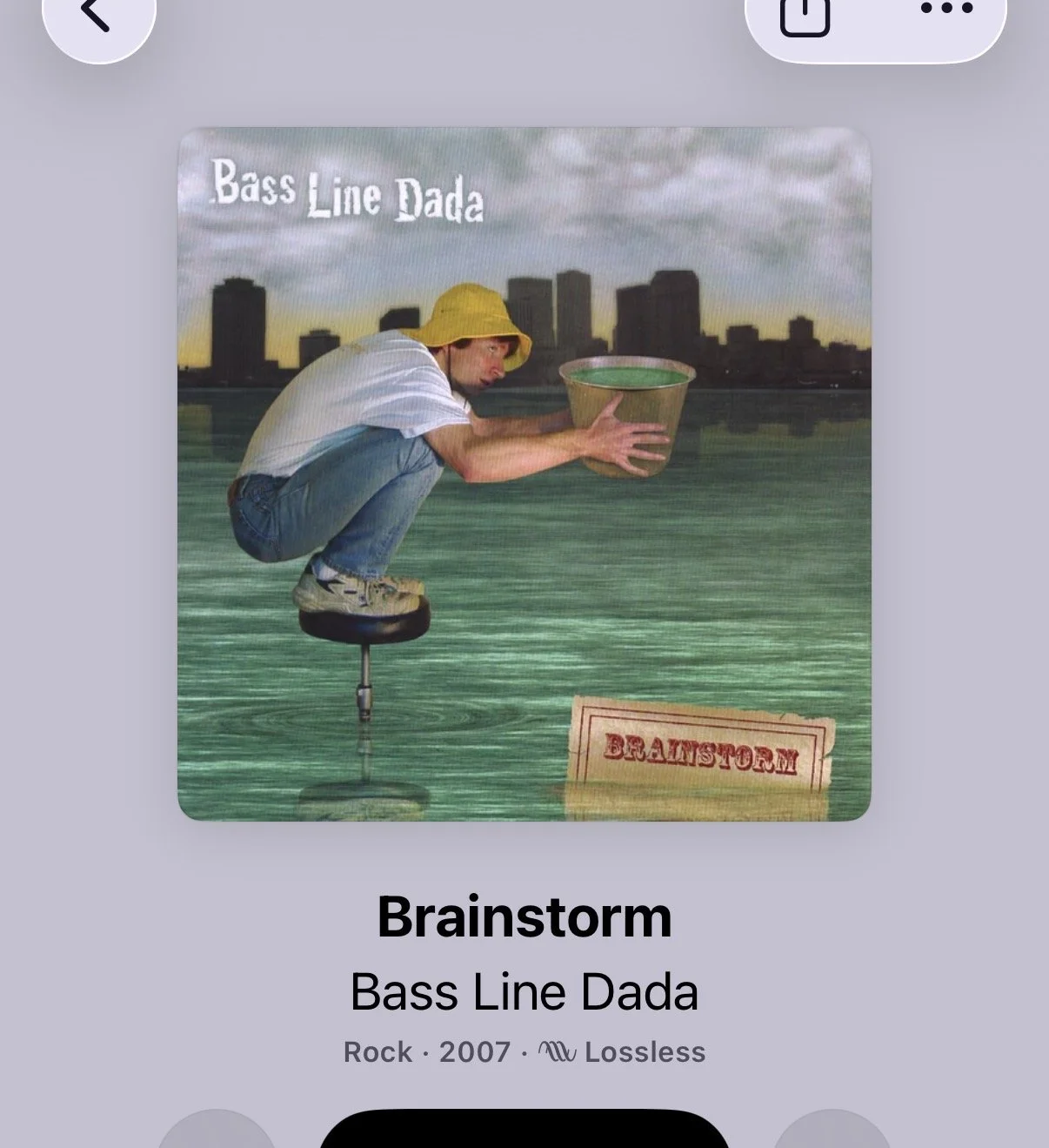Album cover art for the song 'Brainstorm' by Bass Line Dada. The cover features a person squatting on a stool that replaces their legs, holding a large cup, set against a city skyline background with water at the bottom. The album title and artist name are displayed.