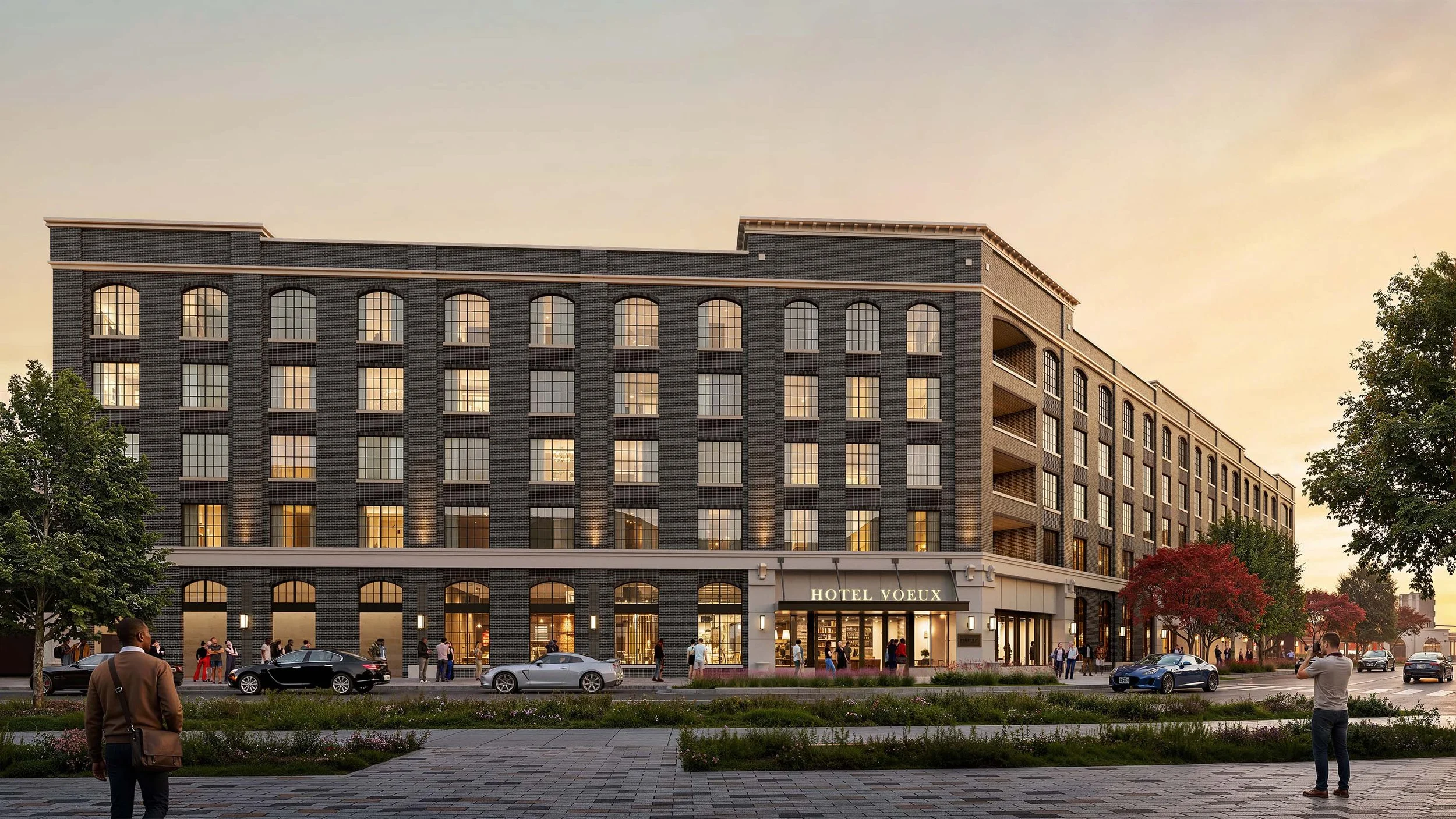 A brick hotel with a cream colored stone storefront