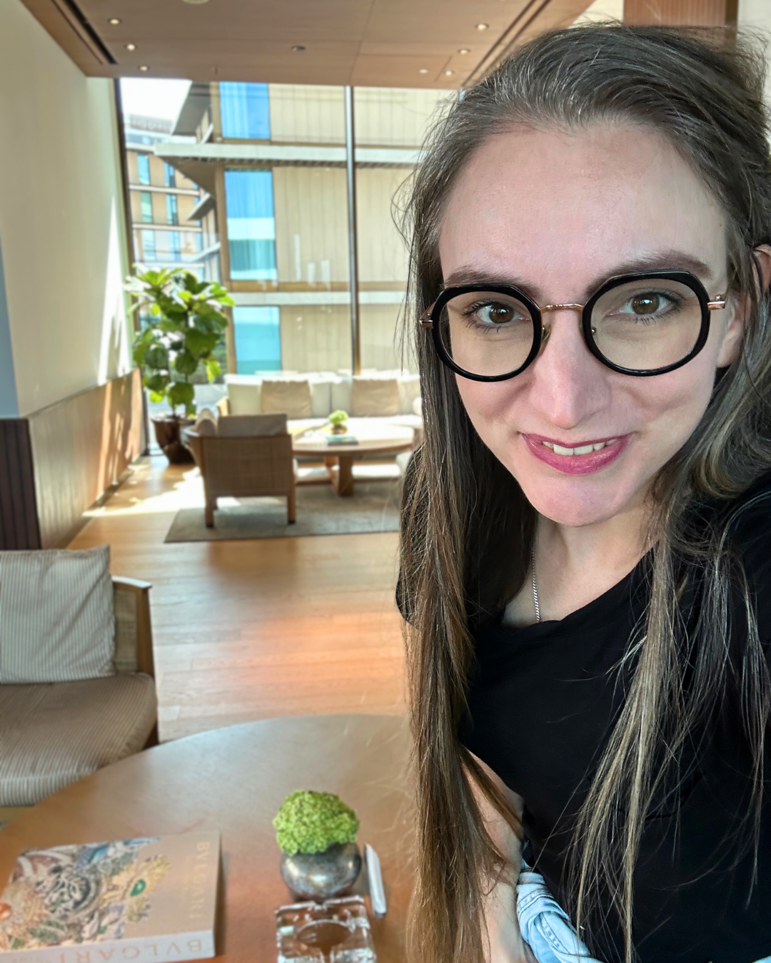 Martina Kikic photographed in a Dubai hotel lounge between client meetings