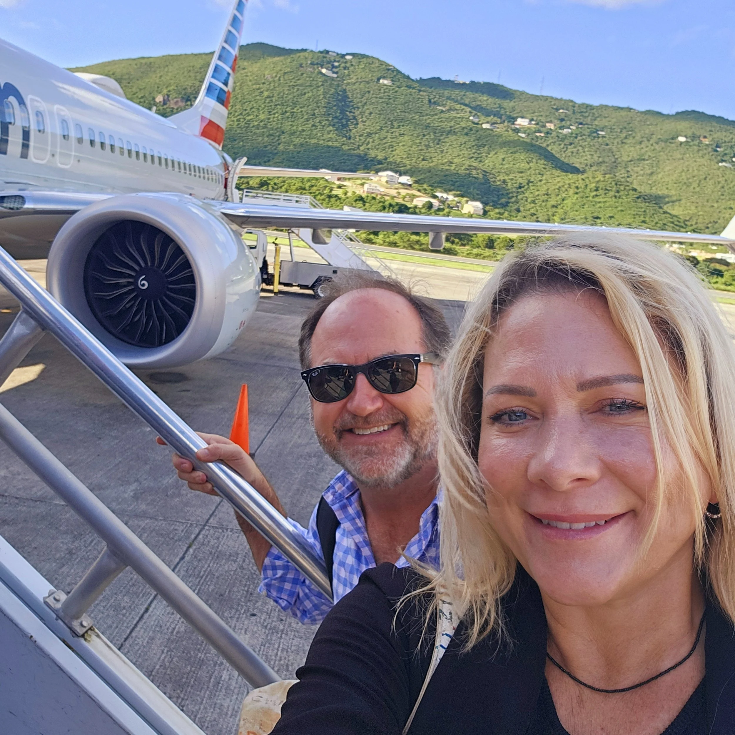 Just Ask Mitchy boarding a plane in the US Virgin Islands