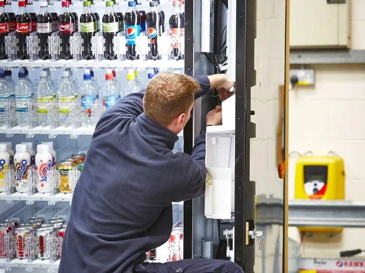 Combination snack and beverage vending machine for offices and gyms