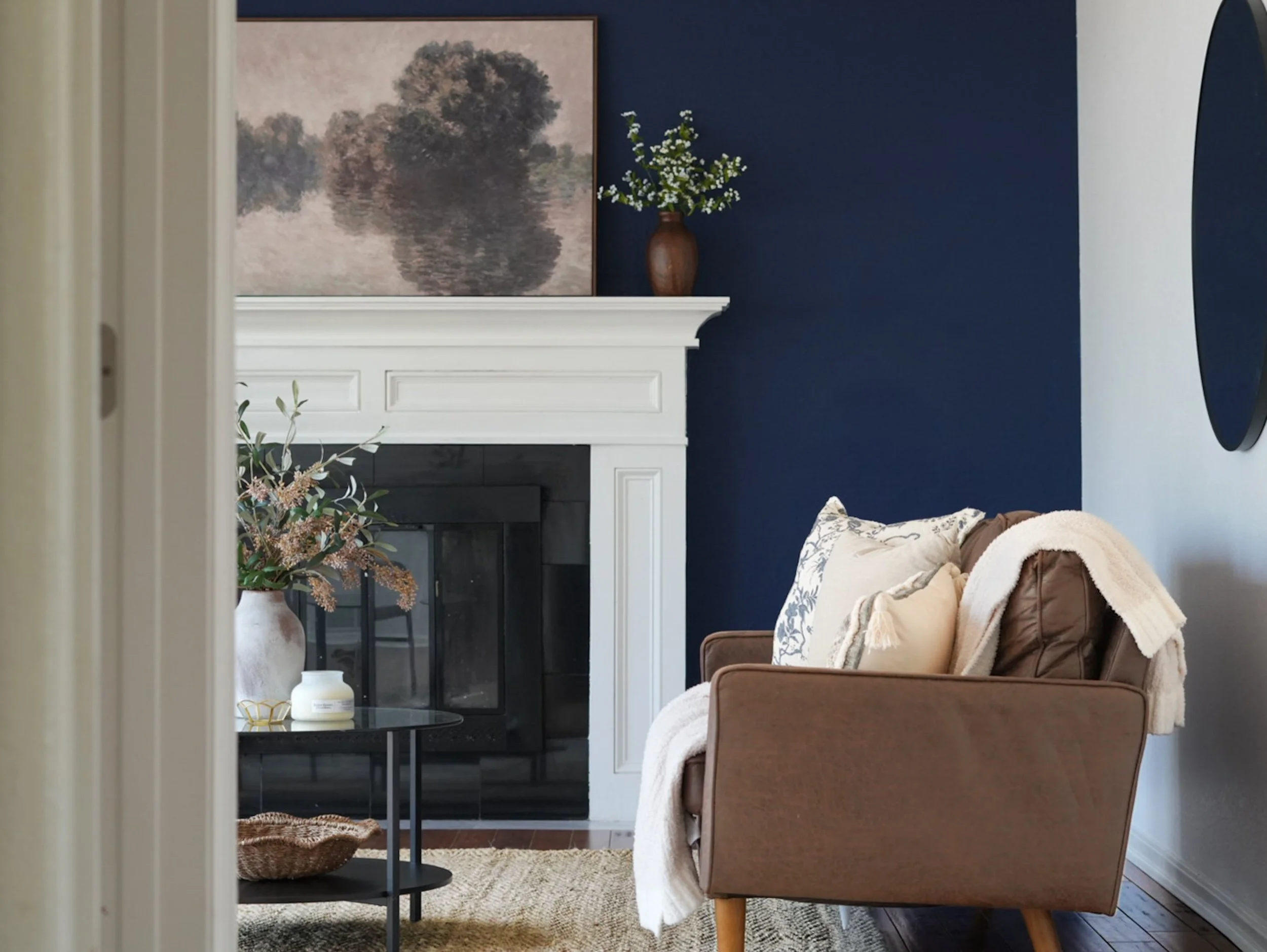 Blue color wash staged living room with mantle