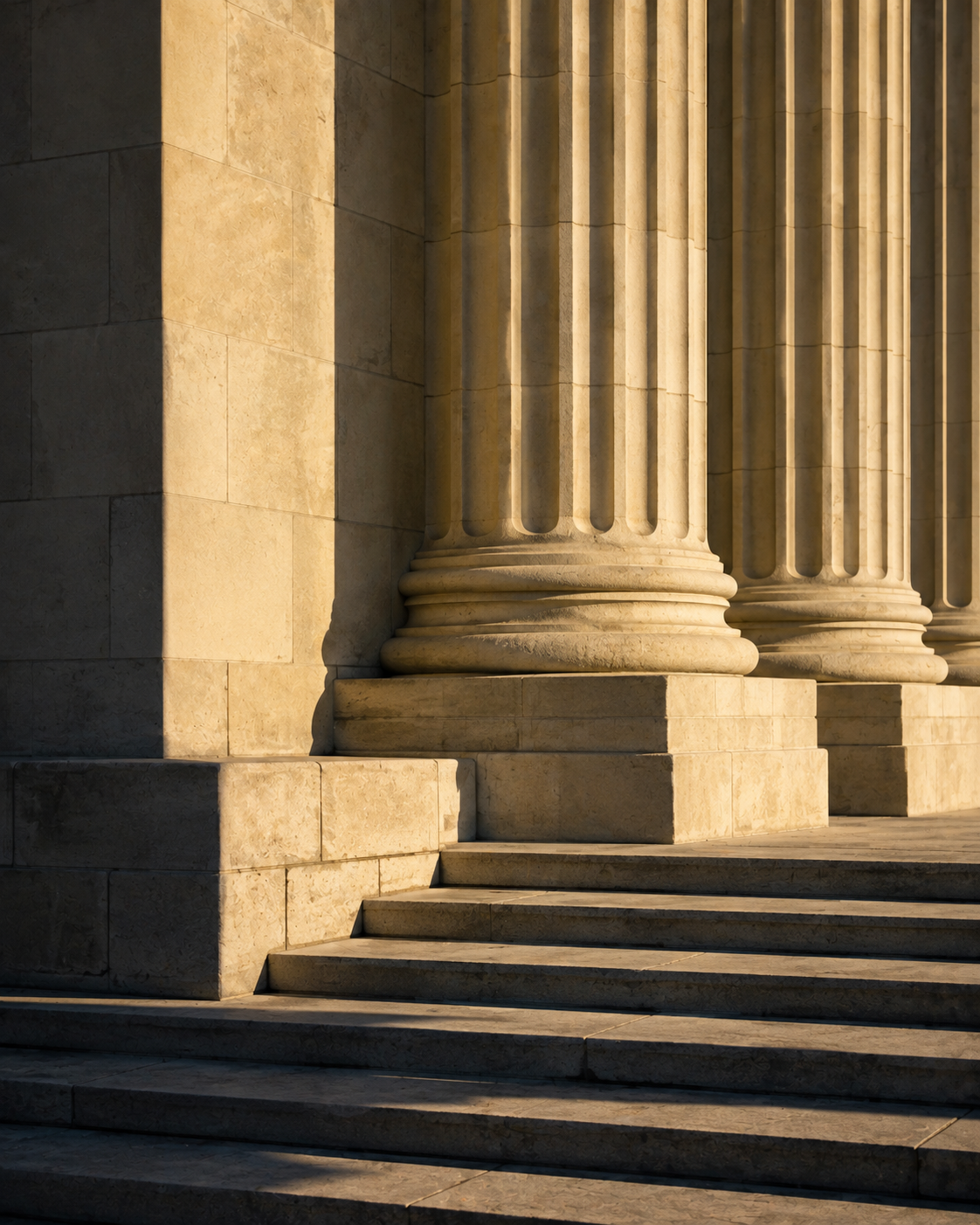Architectural columns representing trusted counsel, leadership, and strategic advisory expertise.