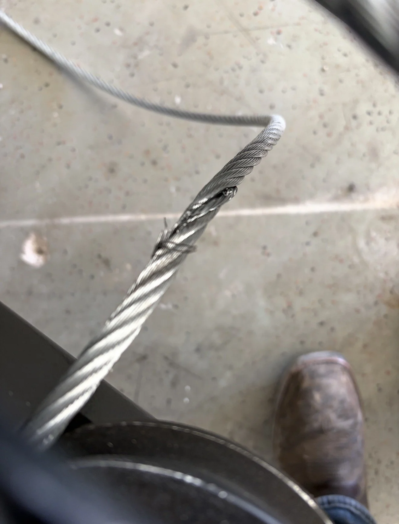 frayed cable for a automotive lift