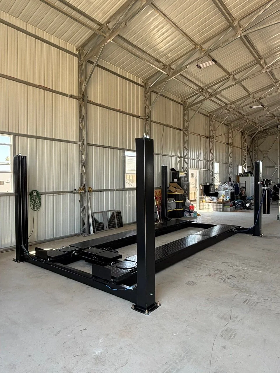 champion auto lifts 14k alighnment four post automotive lift install in Kingman, Arizona