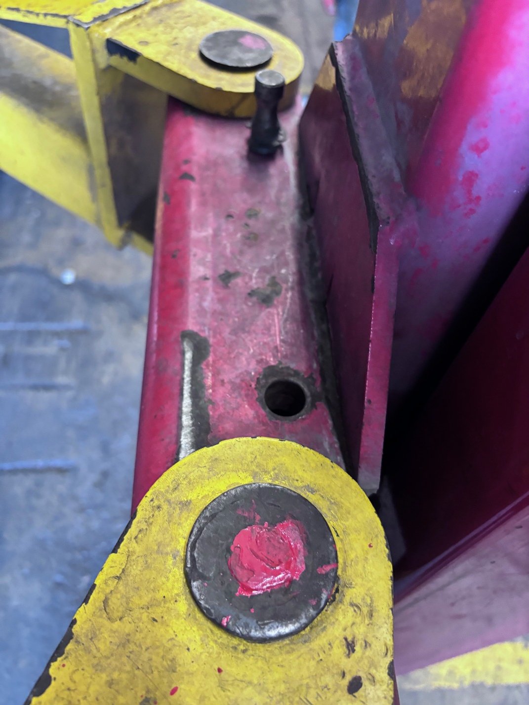 broken two post automotive lift arm lock