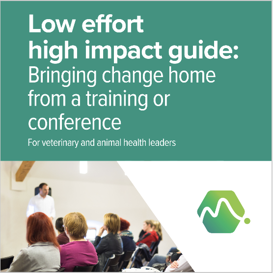 A book cover titled 'Low effort high impact guide: Bringing change home from a training or conference for veterinary and animal health leaders.' The cover features a photo of a presenter speaking to an audience seated in a room with white walls and wooden beams, and a green and white logo.