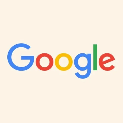 Google logo with multicolored letters on a light background.