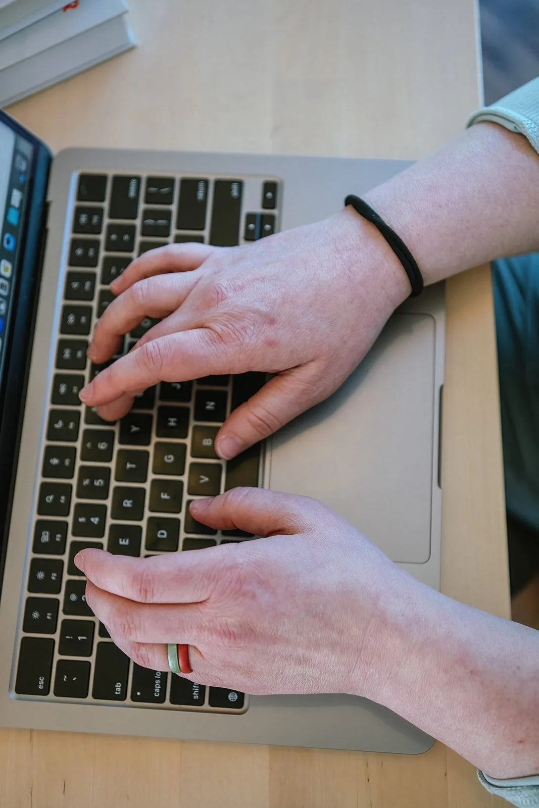 Amanda Townsend typing on a laptop keyboard
