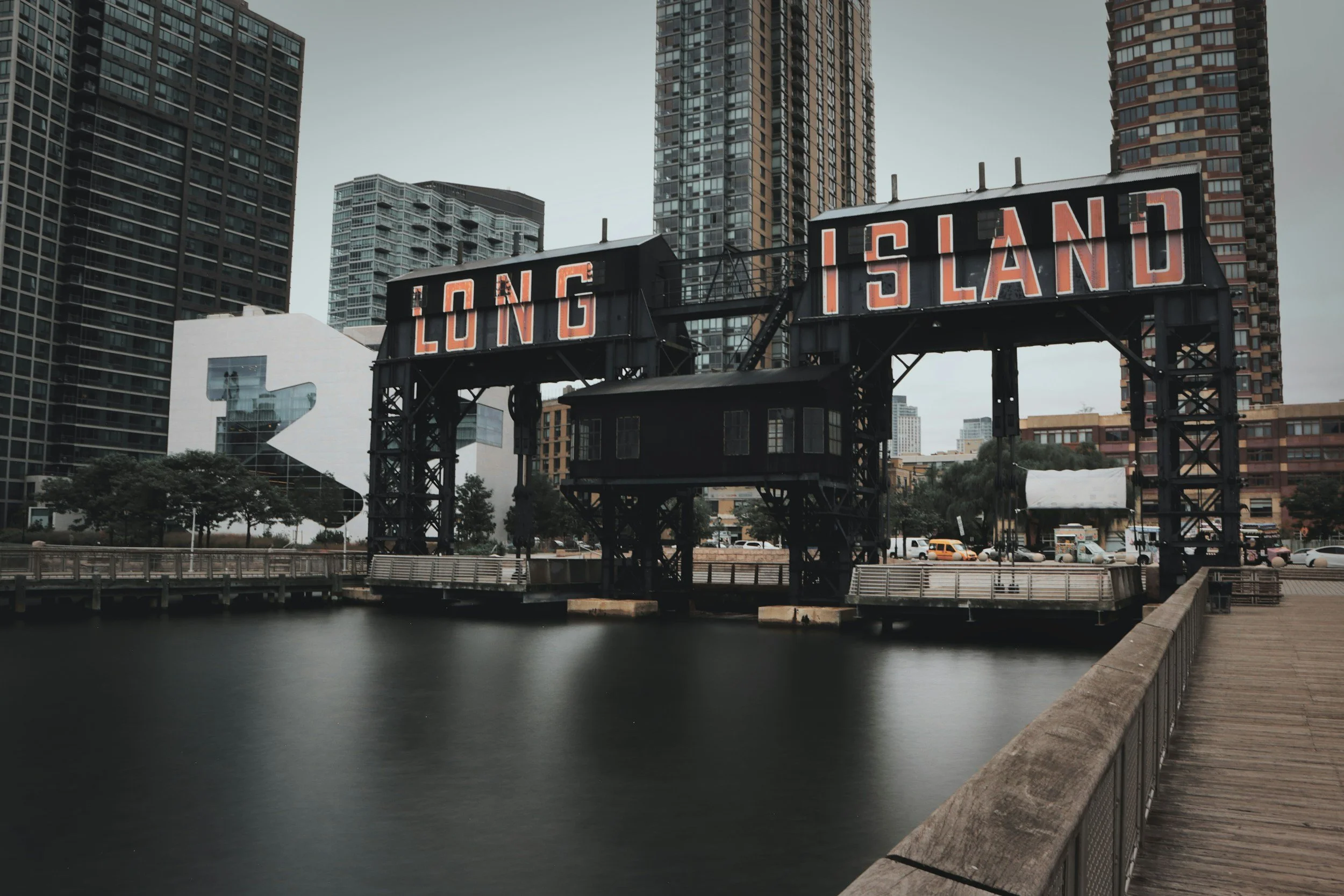 billboard over water that says Long Island