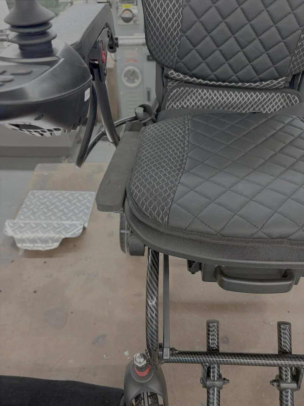 Wheelchair arm/seat modifications