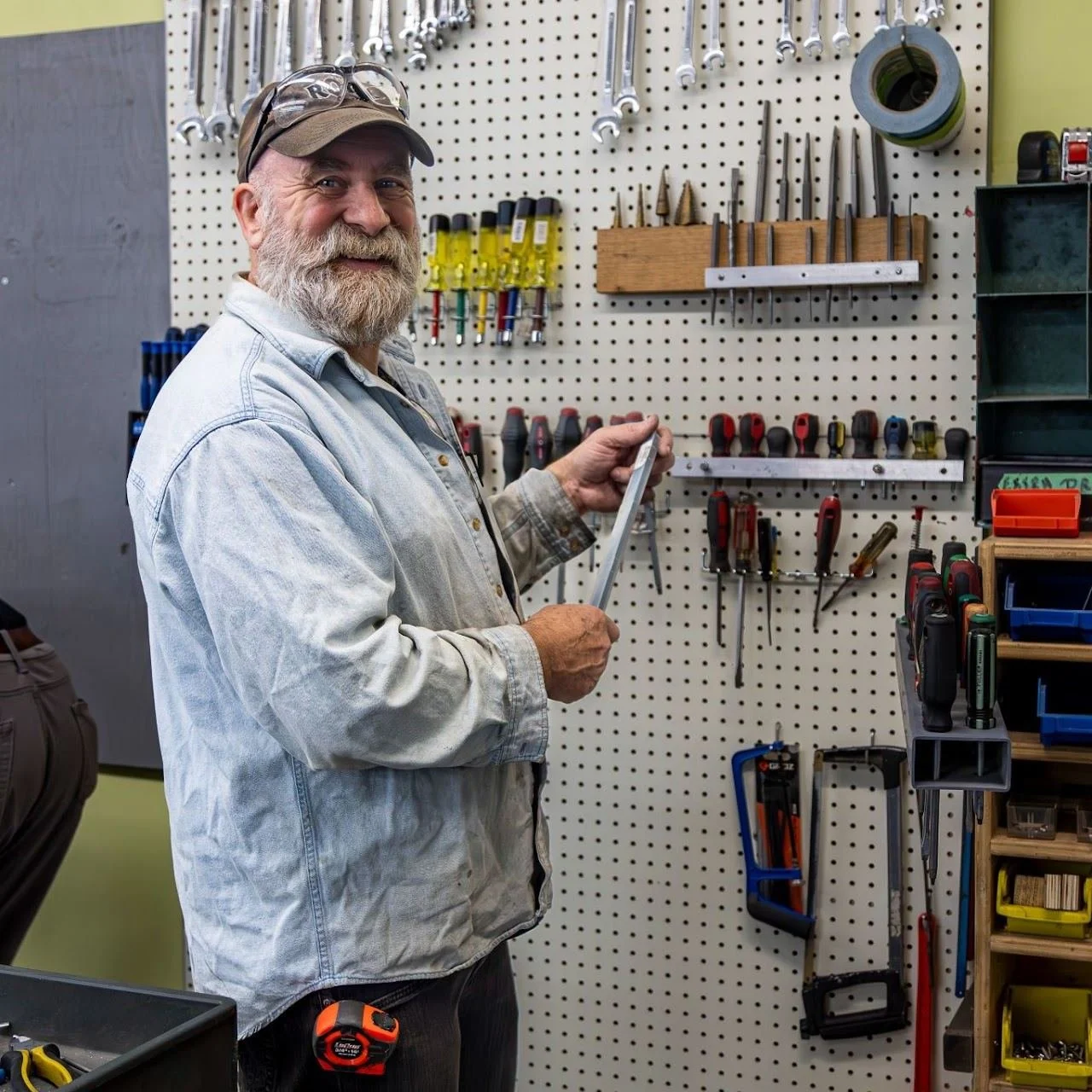 Ability Workshop volunteer at work in the shop