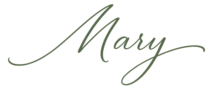 The name "Mary" written in elegant, cursive, dark green script on a black background.