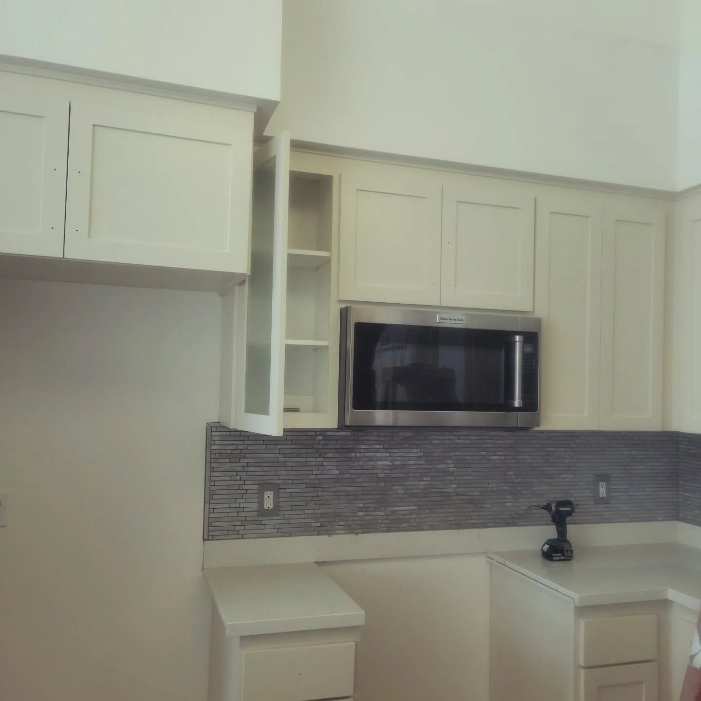 We also refinish or paint cabinets that were stained previously. These cabinets were stain veneer prior to painting.