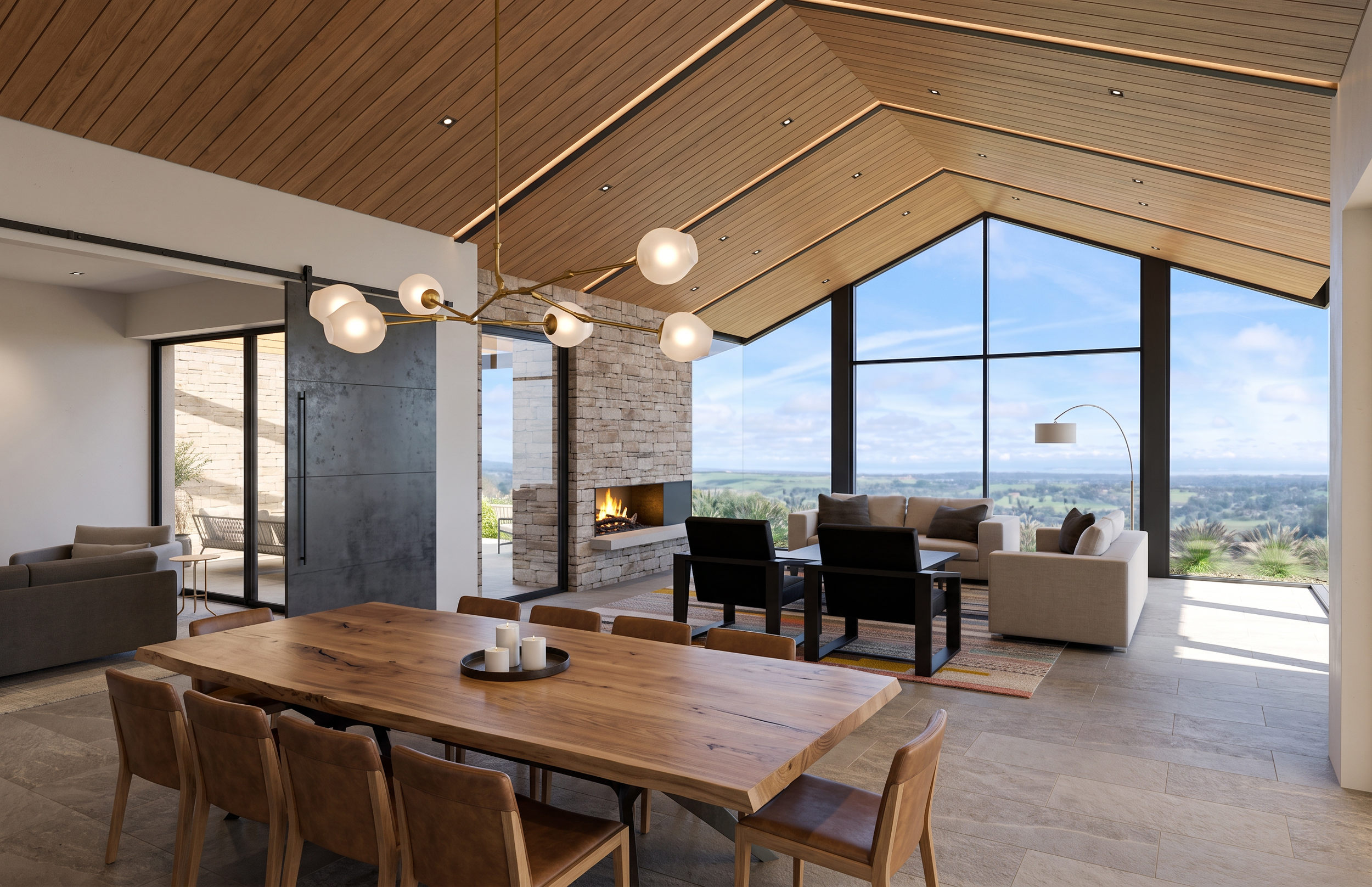 Modern living room with wooden ceiling, large windows showing outdoor landscape, fireplace, and contemporary furniture.