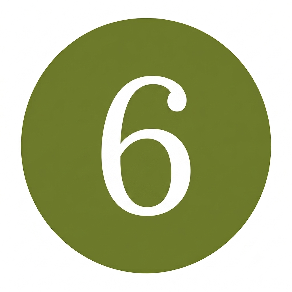A green circular sign with white number six in the center.
