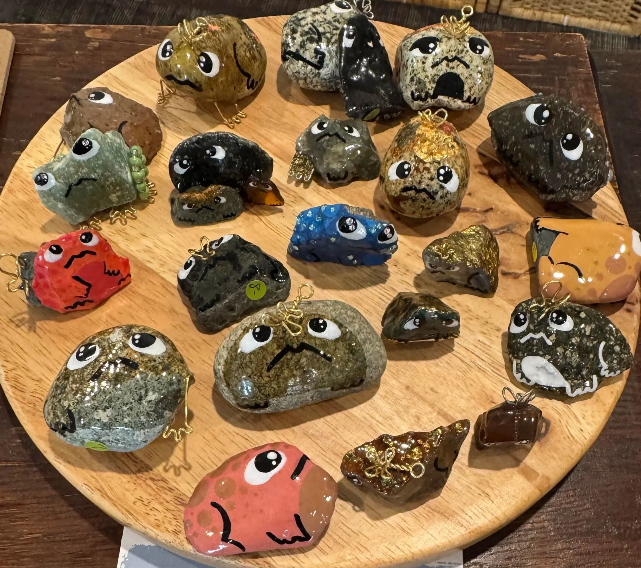 Little Frogs (2025): Acrylic paint and UV resin on rocks