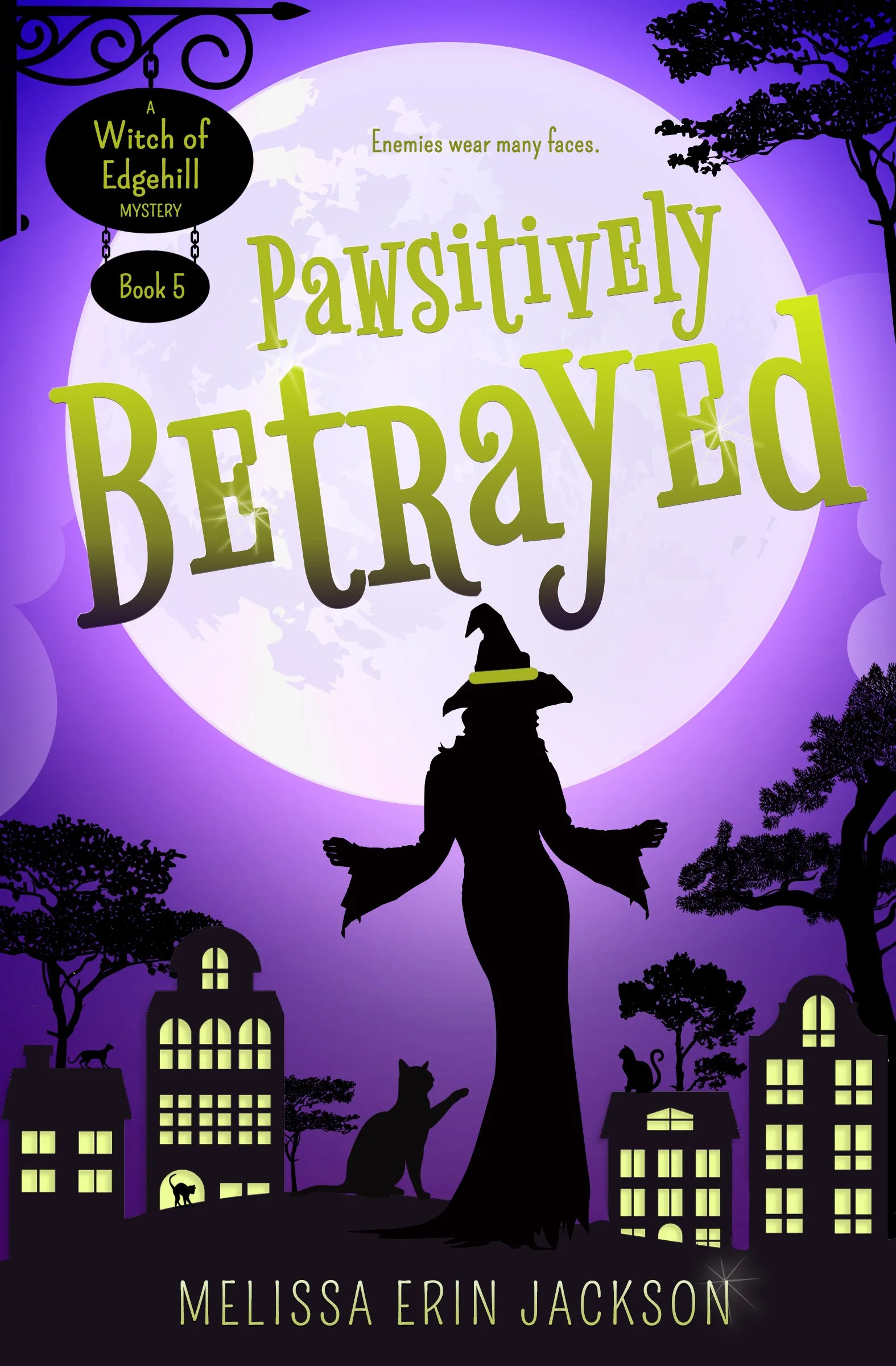 Book cover for 'Pawsitively Betrayed' by Melissa Erin Jackson, part of the 'A Witch of Edgehill Mystery' series, Book 5. The cover depicts a silhouette of a witch with arms outstretched, standing in front of the moon. The background is purple with silhouettes of houses, trees, and cats. The title is in large, green, playful fonts, and the author's name is at the bottom in smaller yellow font.