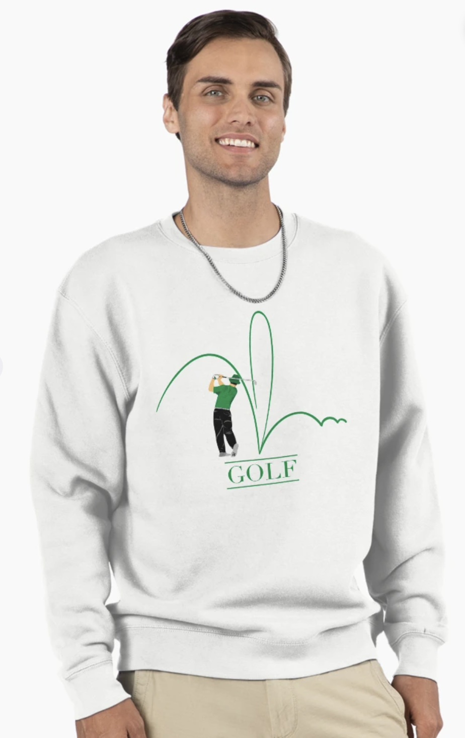 Young man wearing a white sweatshirt with a golf-themed graphic design, smiling against a plain white background.