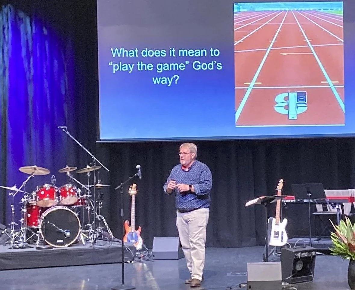 Pastor Darren delivering a sermon during school holidays.