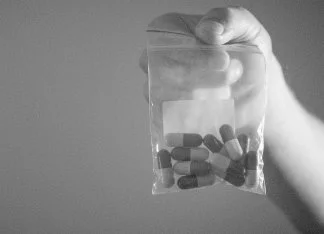 Illegal drugs — pills in a bag