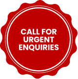 Red badge-shaped sign with white text that says 'Call for Urgent Enquiries'.