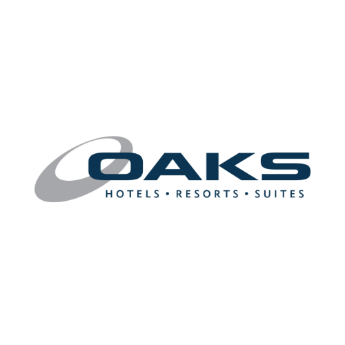 Oaks Hotels Resorts Suites logo in black and blue text with a silver swoosh