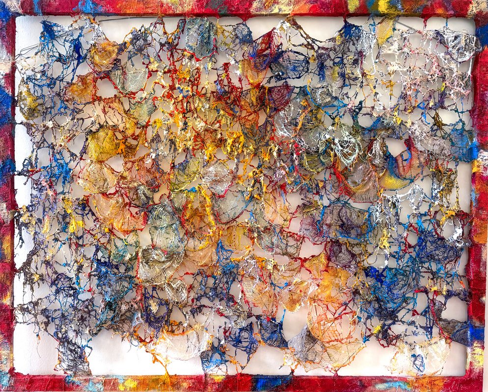 Abstract mixed media artwork featuring a chaotic web of colorful threads and tissue paper on a white background, bordered by a painted frame.