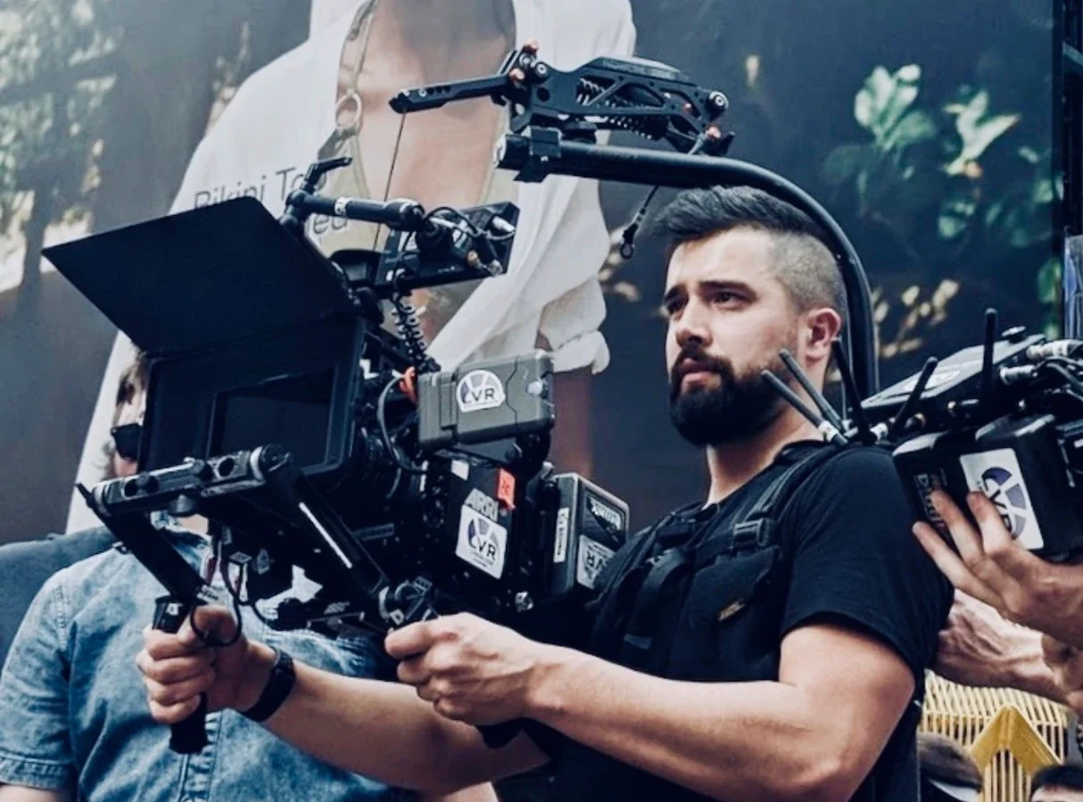Erin Collette holding a camera