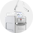 Medical imaging machine, possibly an MRI or CT scanner, in a clinical setting.