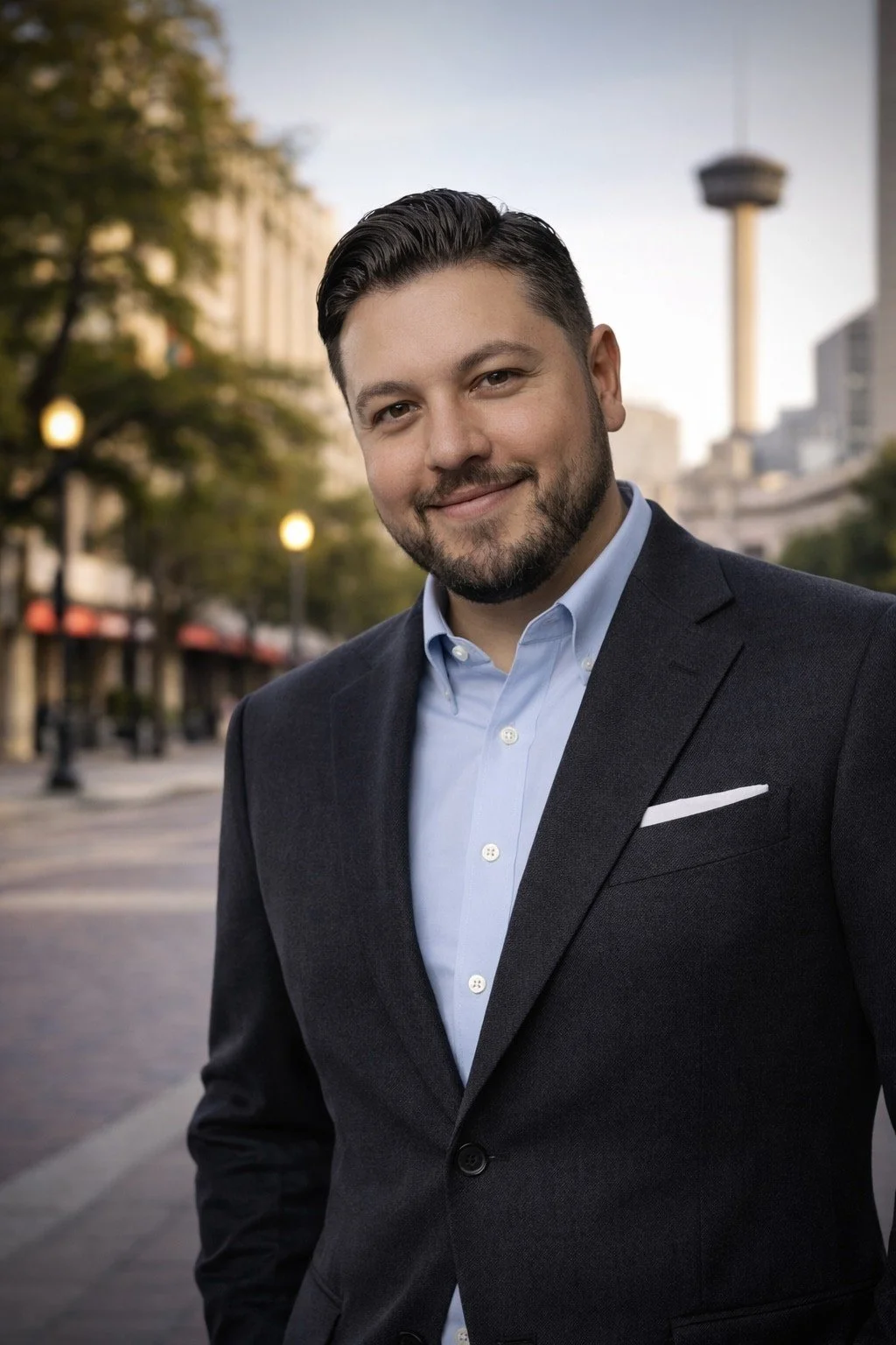 Jake Ledesma, MSSW, LCSW, Founder & Clinical Director of STX Therapy, photographed on a downtown San Antonio street.