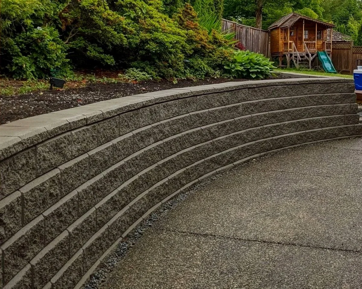 
Curved Allan Block retaining wall - Coquitlam backyard
