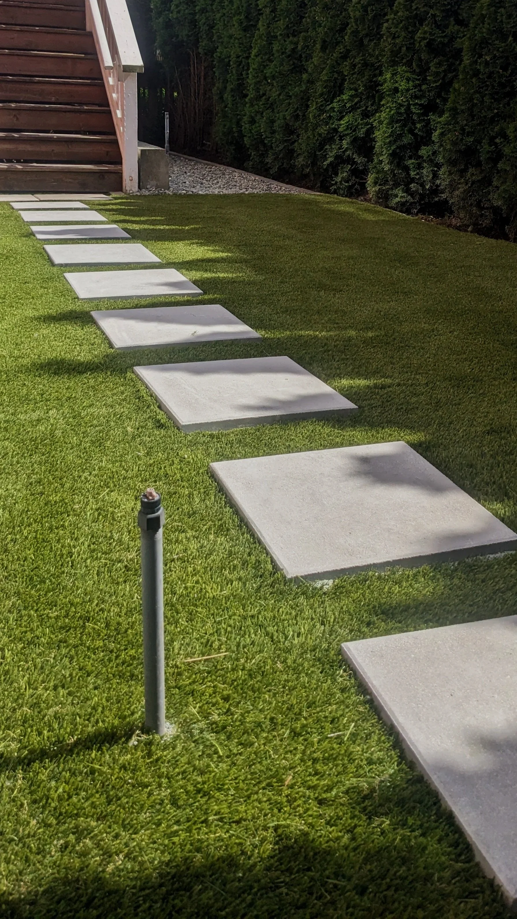 Artificial turf with paver slab walkway - New Westminster backyard