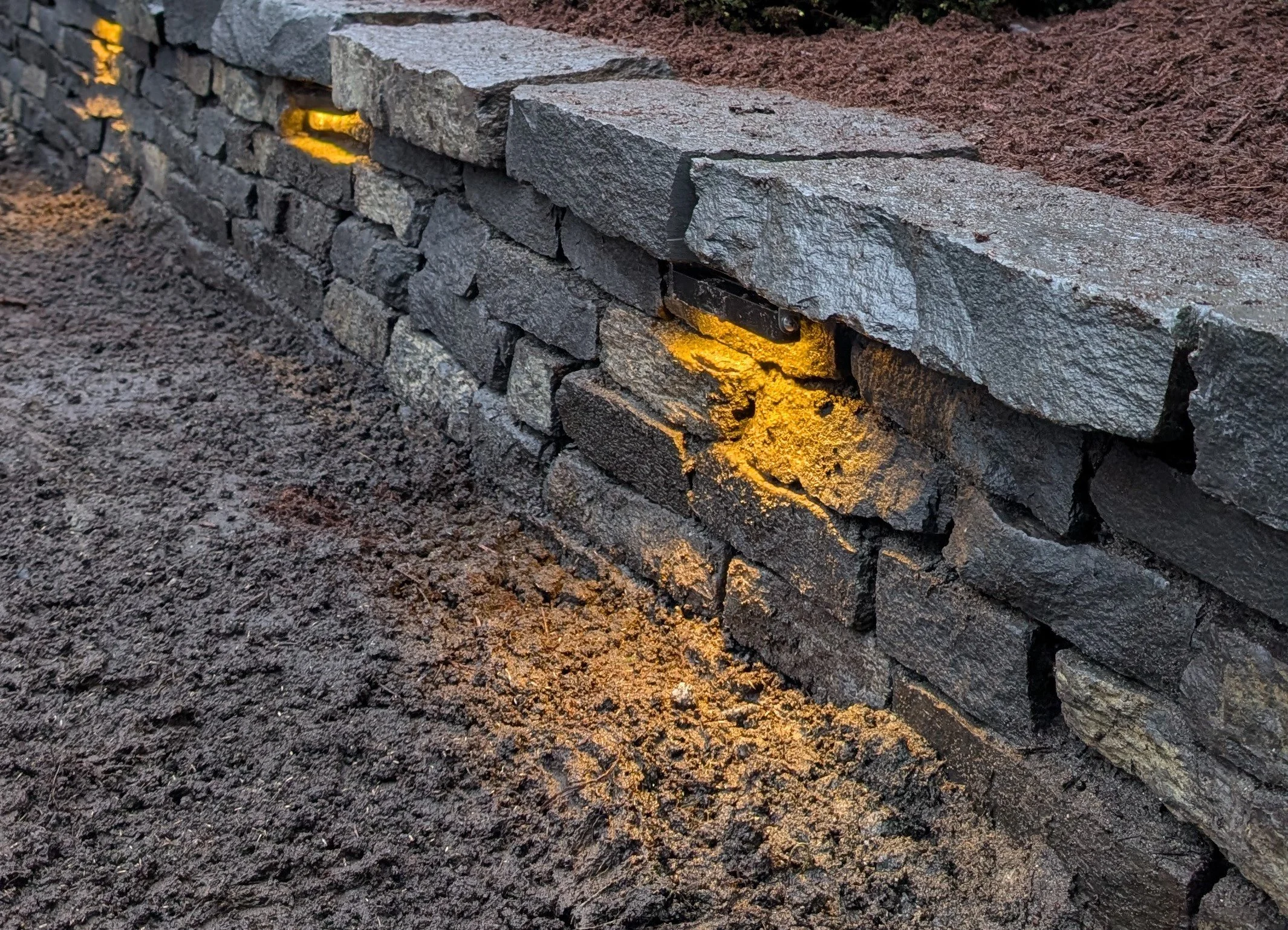 Retaining wall with integrated lighting - New Westminster backyard