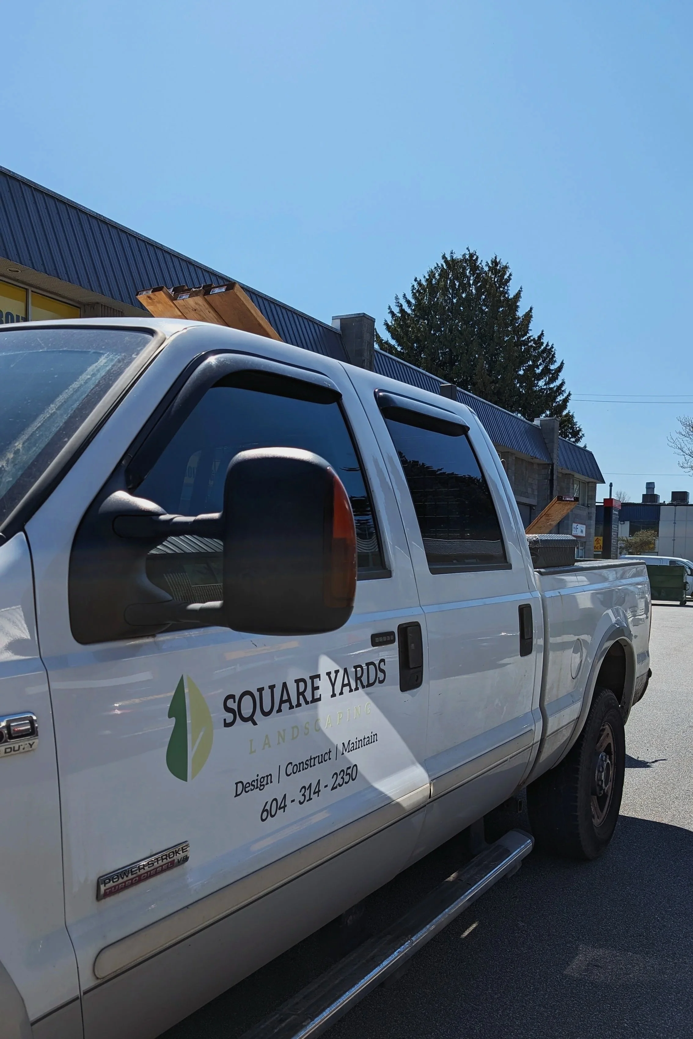Square Yards Landscaping company truck on-site - Burnaby
