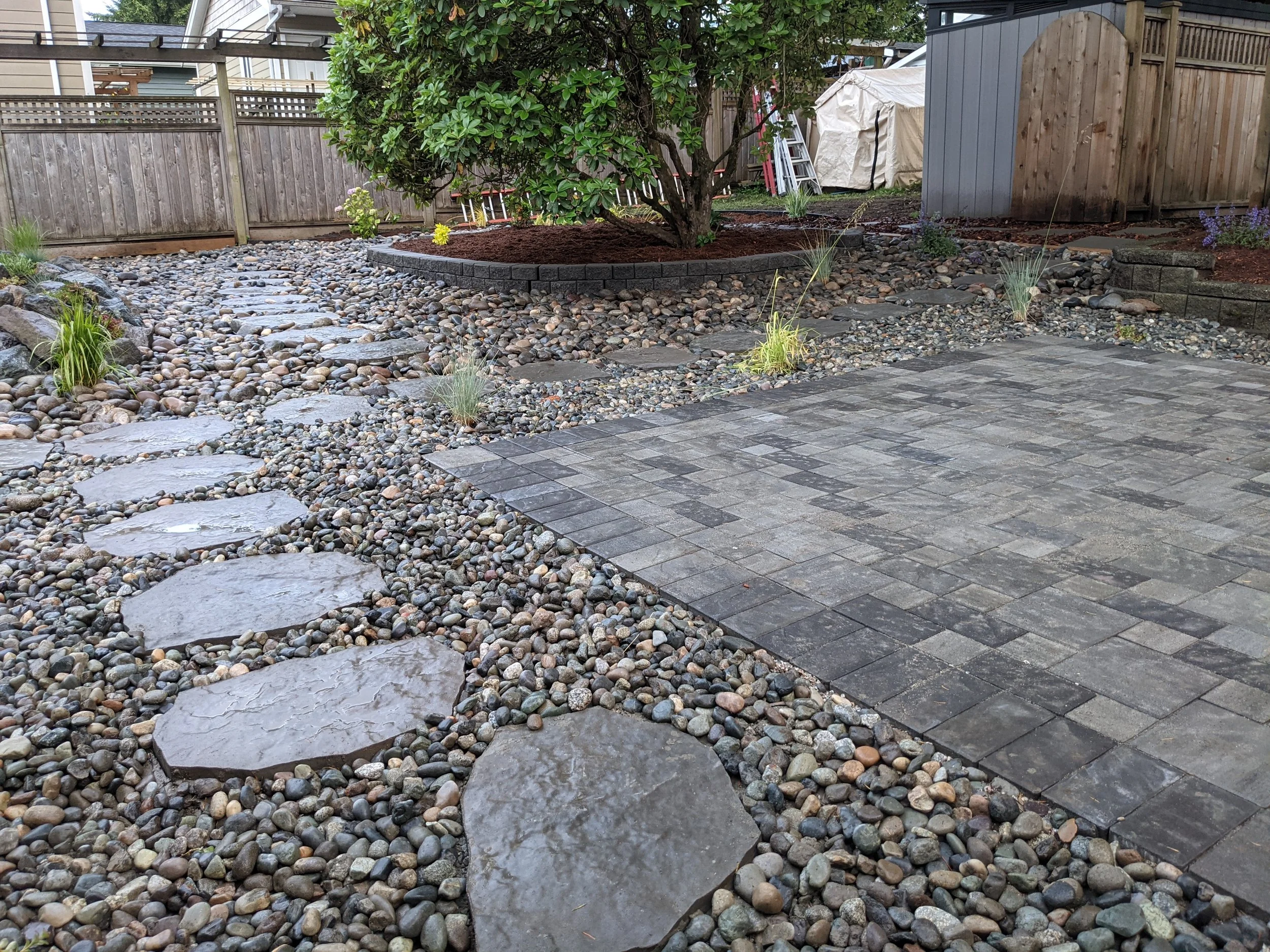 Paver patio with river stone - New Westminster backyard