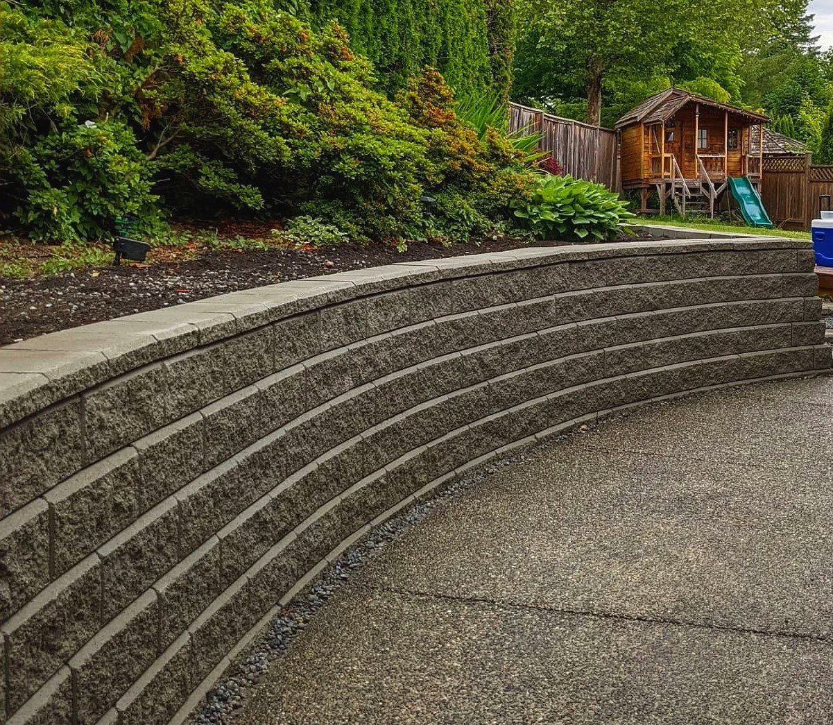 Curved Allan Block retaining wall - Coquitlam, backyard