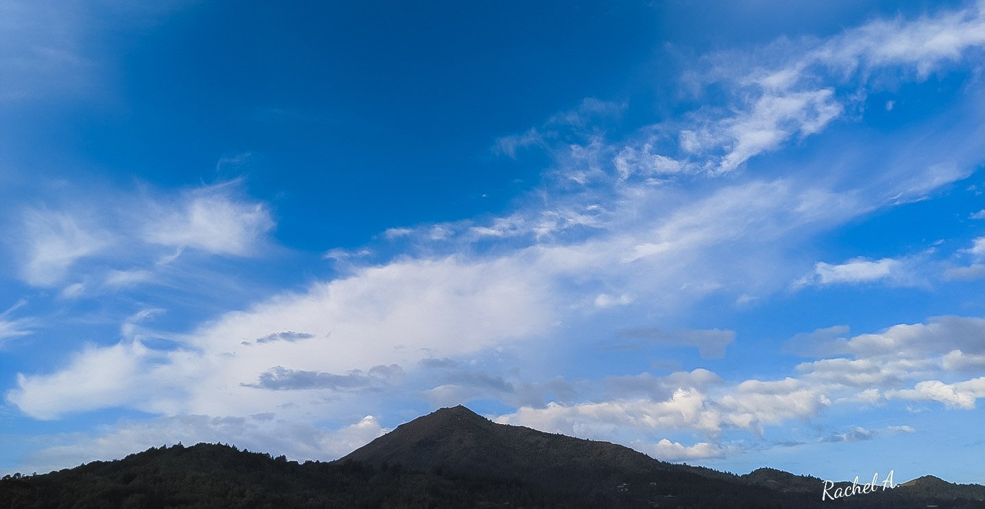 cloudy blue sky and tam silhouette .jpg