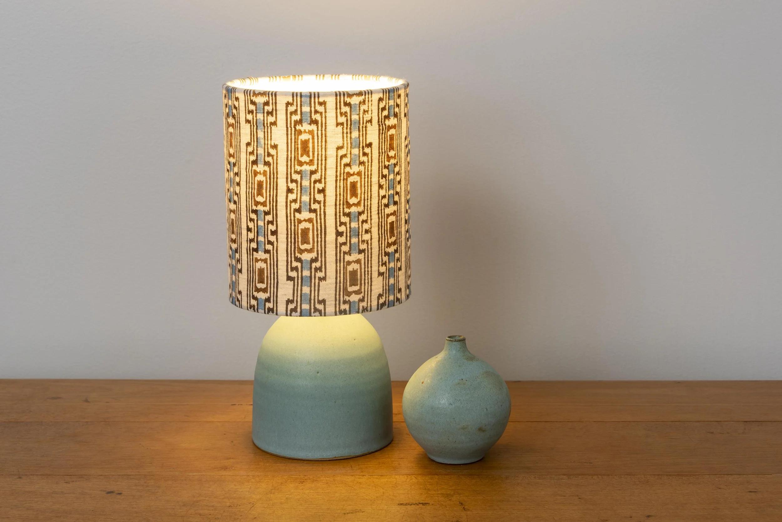 Matt azure glazed base with handblock printed linen shade