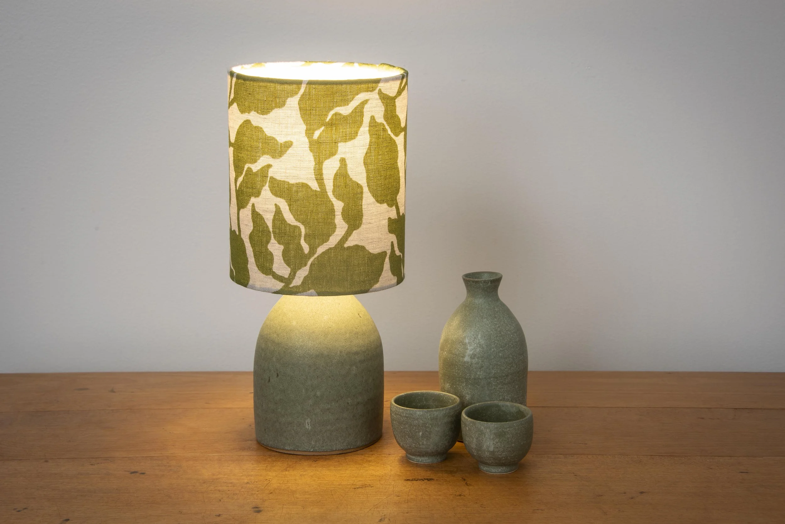 Matt variegated green base with chartreuse handblock printed linen shade