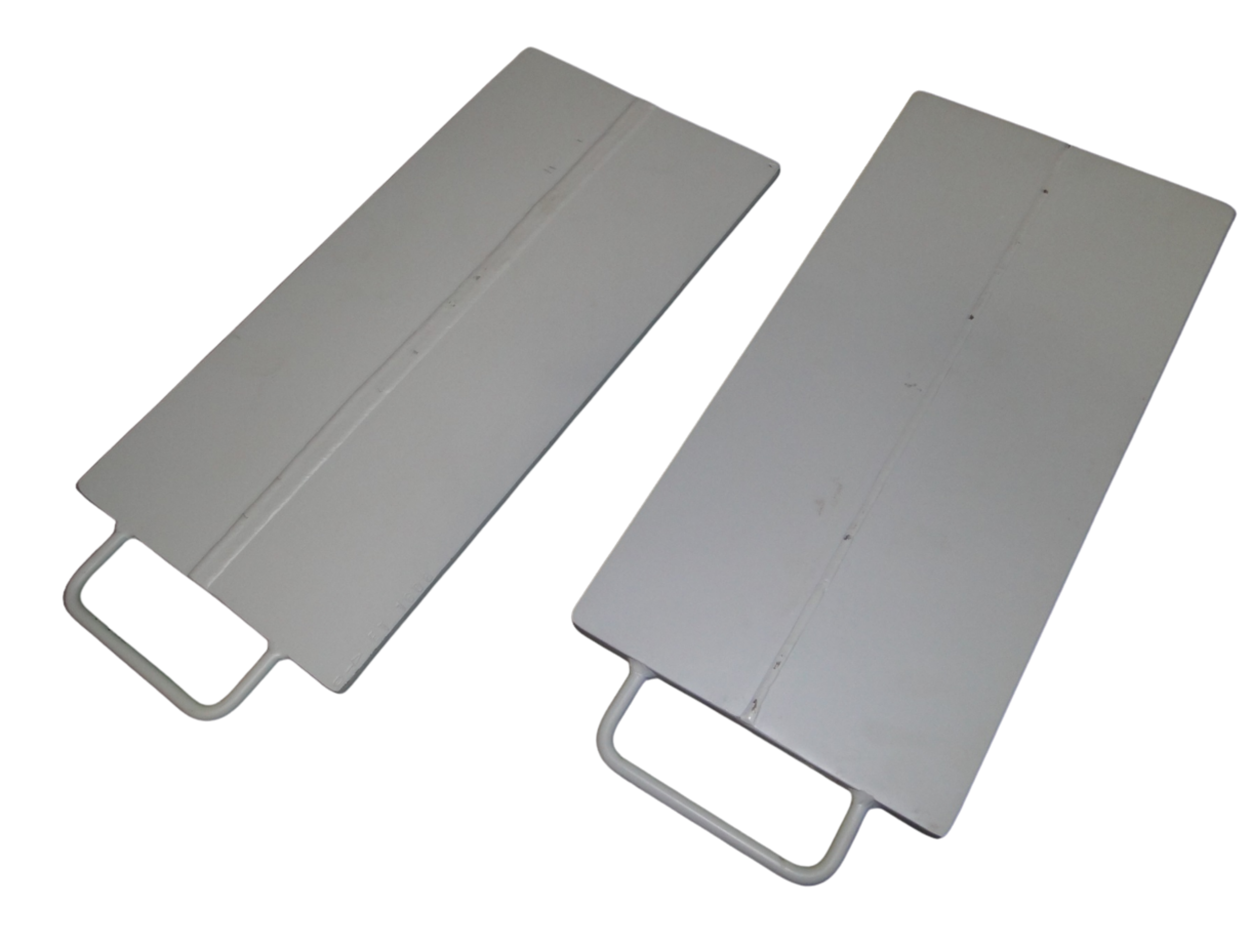 Three gray metal folding tables with white metal legs, overlapping each other.