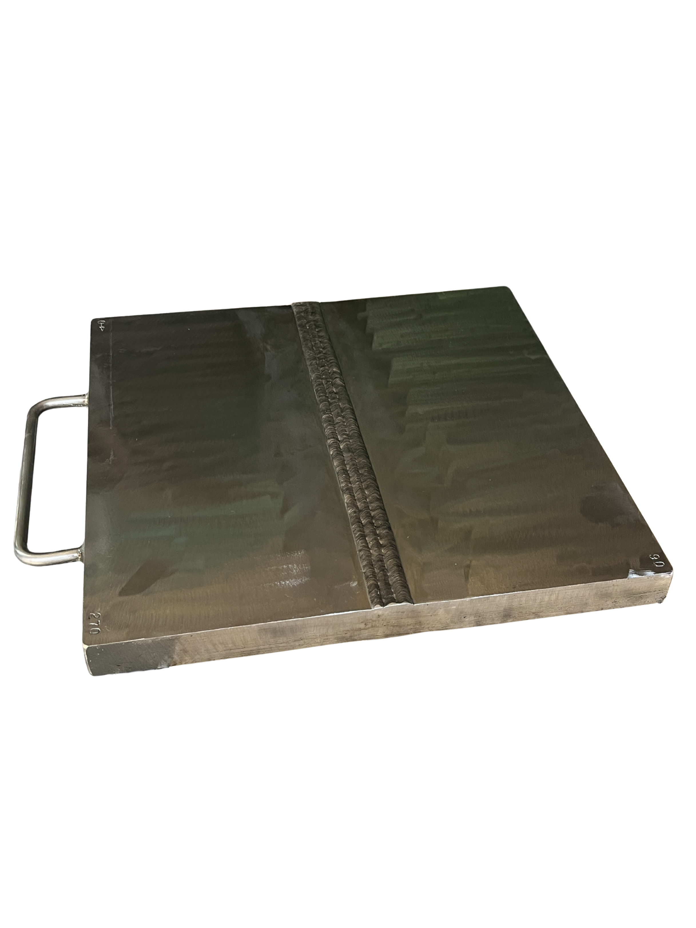 A metal tray with raised handles and a folded piece of dark fabric or leather on top.