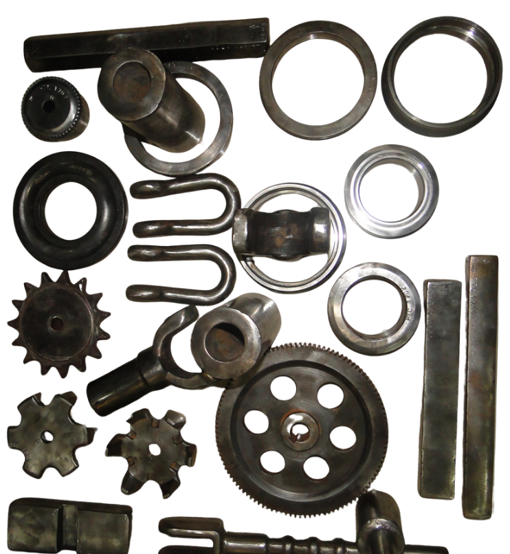A collection of various metal machine parts and gears on a flat surface.