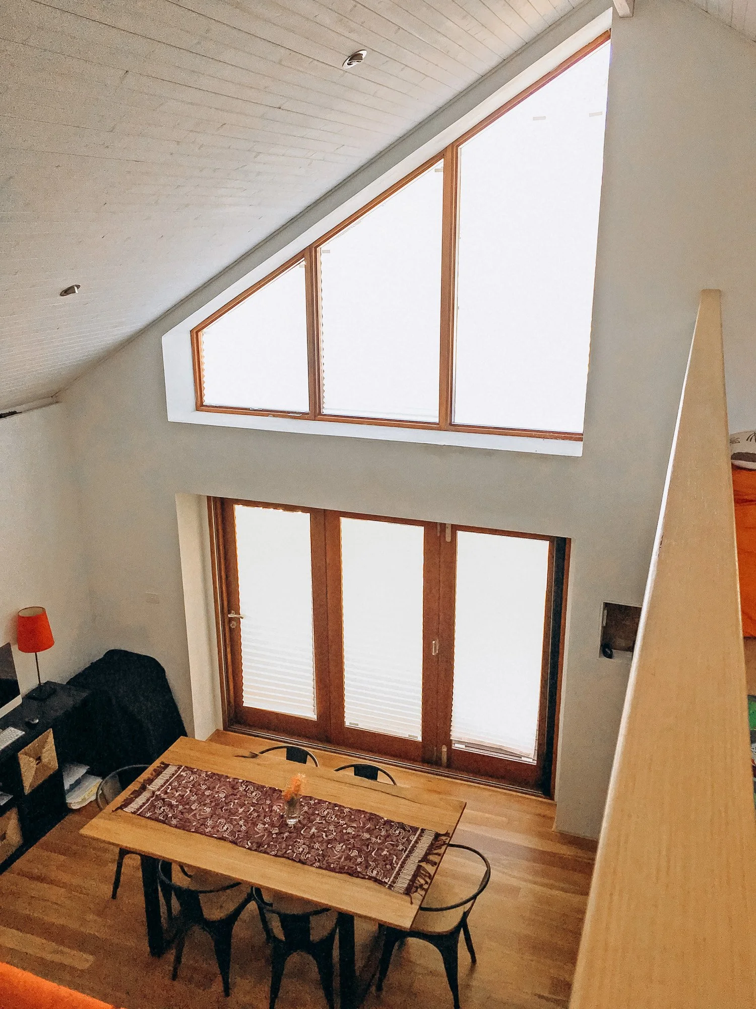 Light-filled interior of G.R.E.B. straw bale home in Hilton with high-level glazing and natural timber detailing