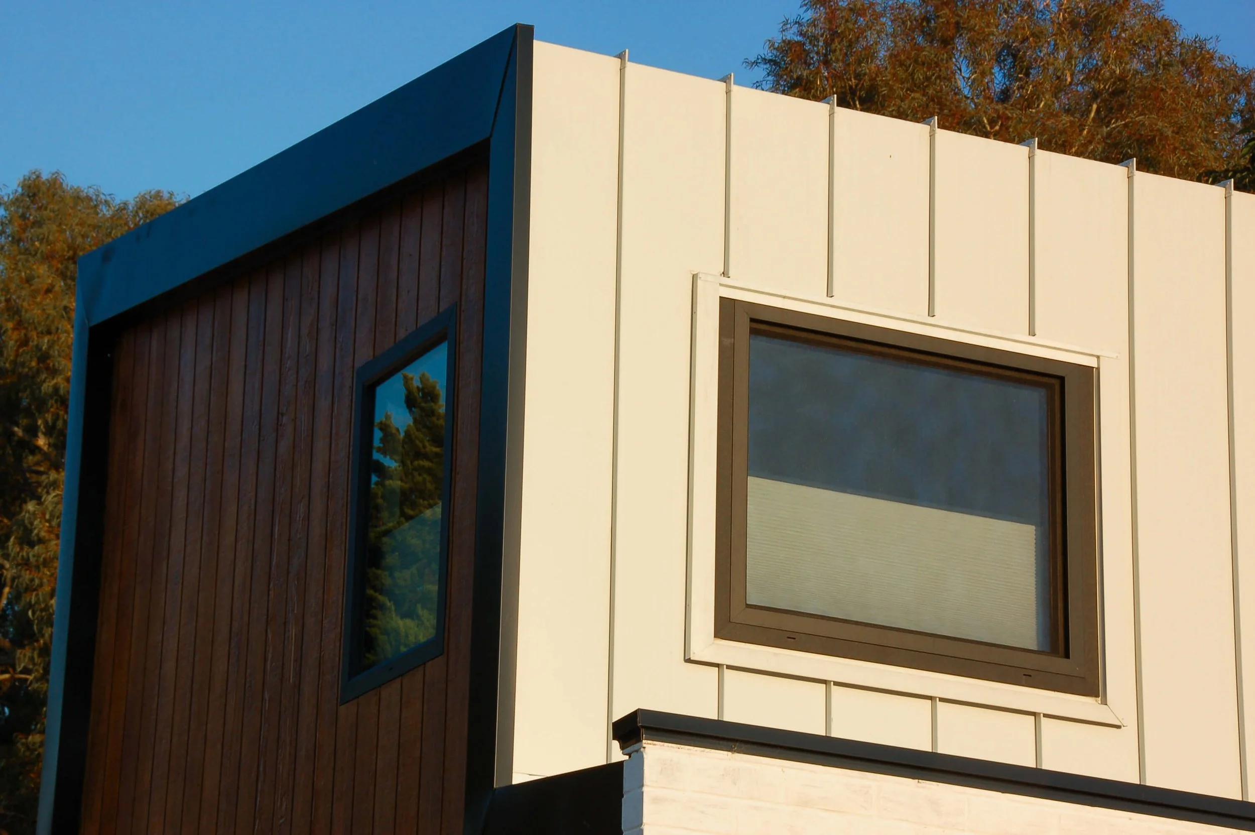 Two-storey ancillary dwelling in Hamilton Hill with timber cladding, standing-seam metal cladding and compact design