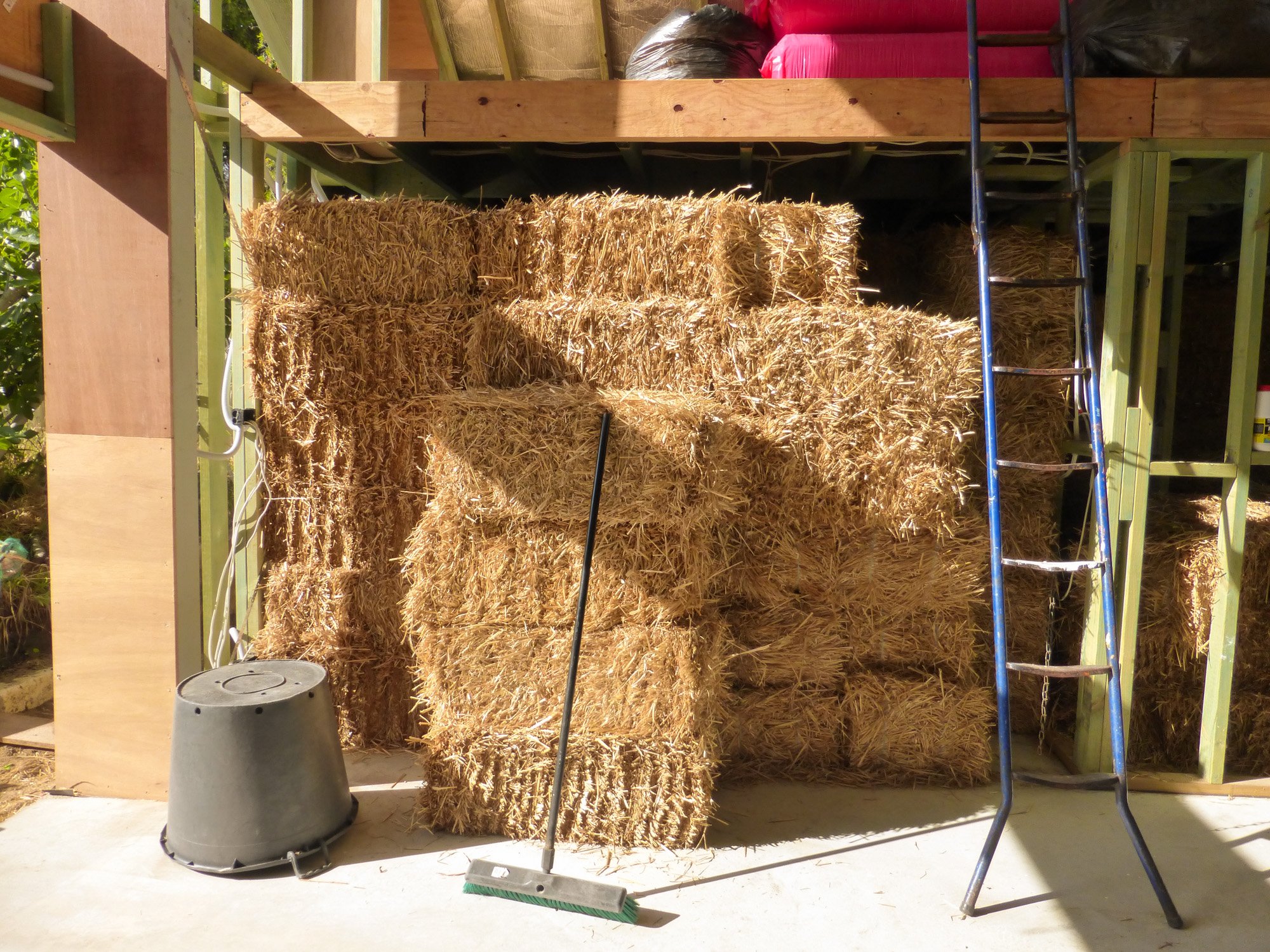 Straw bales ready for G.R.E.B. house construction in Hilton, Western Australia