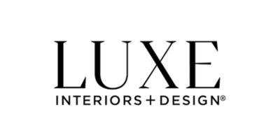 LUXE Interiors+Design logo in black text on a white background